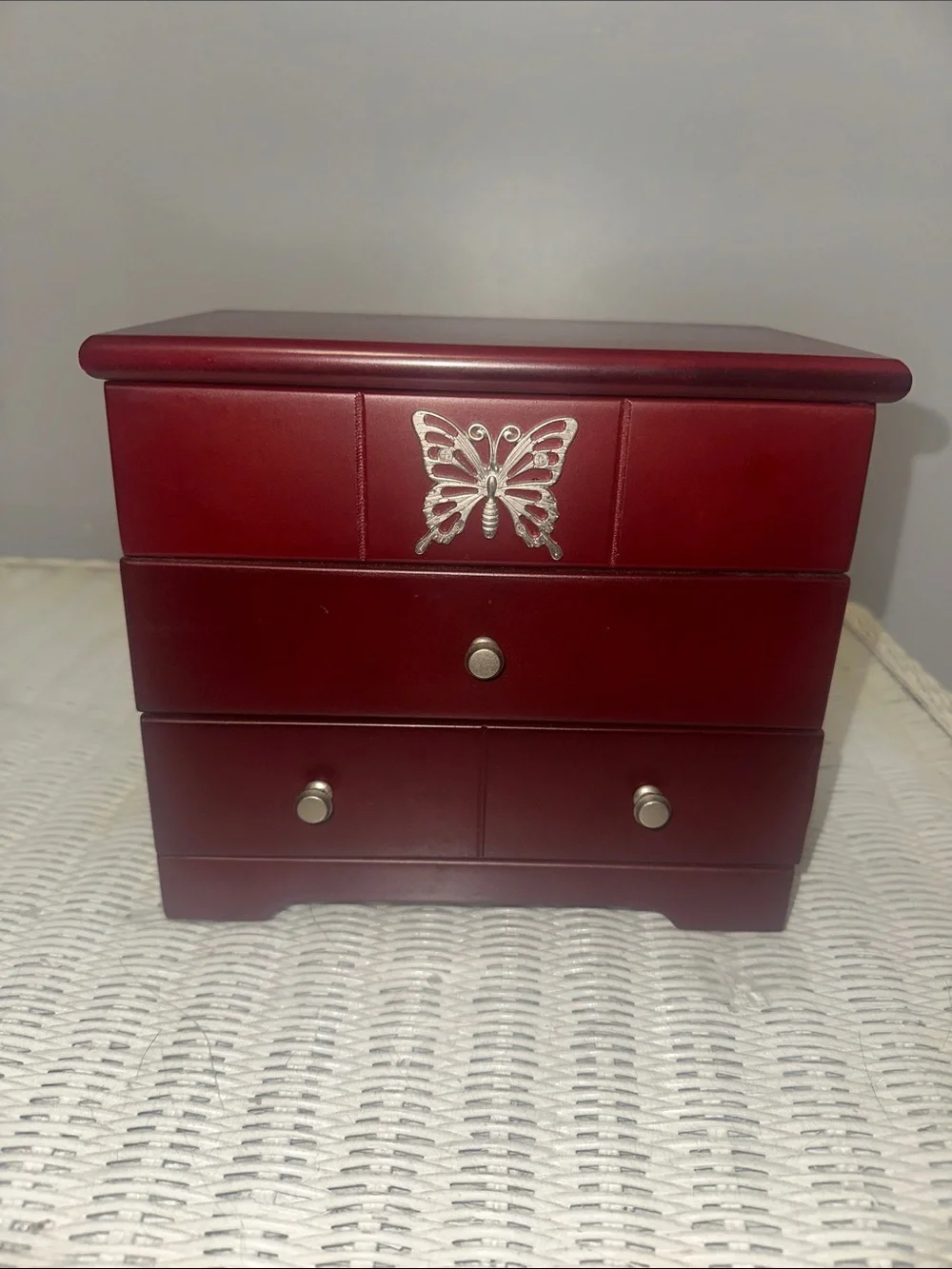 Elegant Red Jewelry Box with Silver Butterfly Accent